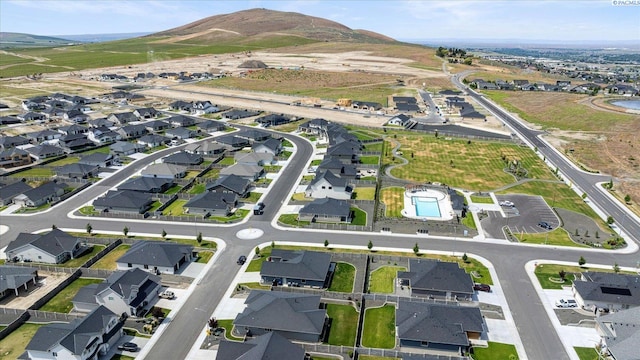 561 Lazio Way, Richland, WA 99352 - aerial view of property and surrounding area featuring mountains and nearby suburban area