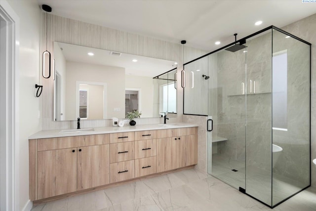 561 Lazio Way, Richland, WA 99352 - bathroom with a shower stall, double vanity, marble finish floors, and recessed lighting