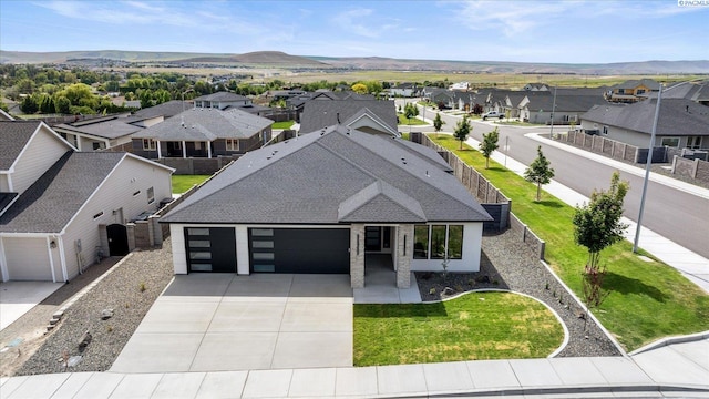 561 Lazio Way, Richland, WA 99352 - aerial view of residential area featuring a mountainous background