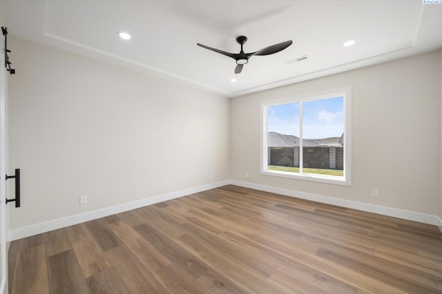 561 Lazio Way, Richland, WA 99352 - spare room featuring a ceiling fan, wood finished floors, baseboards, and recessed lighting