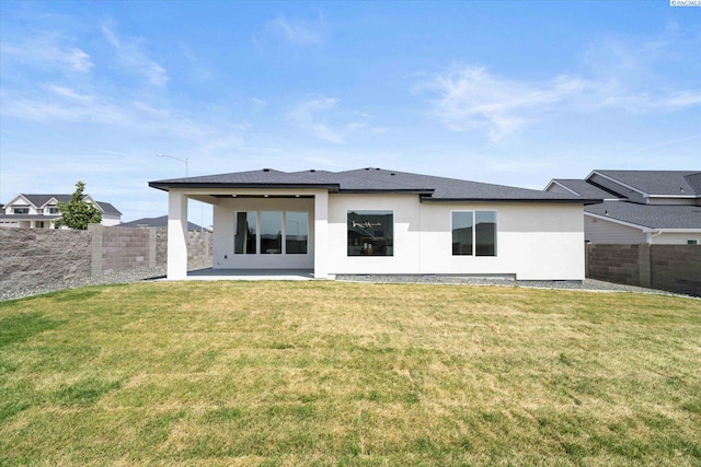 561 Lazio Way, Richland, WA 99352 - rear view of property featuring stucco siding and a patio
