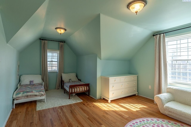 525 SE Water St, Pullman, WA 99163 - living area featuring light wood-style floors and vaulted ceiling