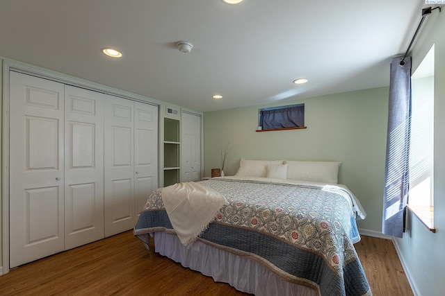 525 SE Water St, Pullman, WA 99163 - bedroom with wood finished floors, baseboards, visible vents, and recessed lighting