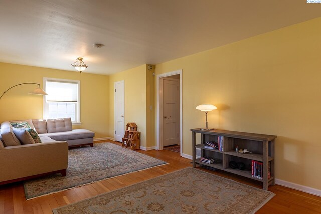 525 SE Water St, Pullman, WA 99163 - living area with baseboards and hardwood / wood-style floors