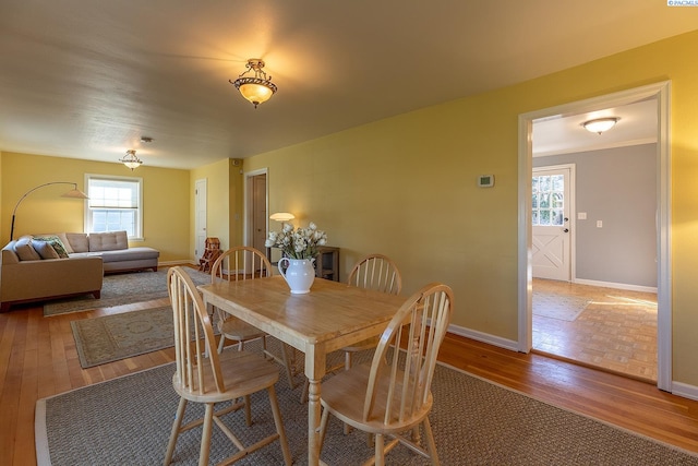 525 SE Water St, Pullman, WA 99163 - dining space featuring baseboards and wood finished floors