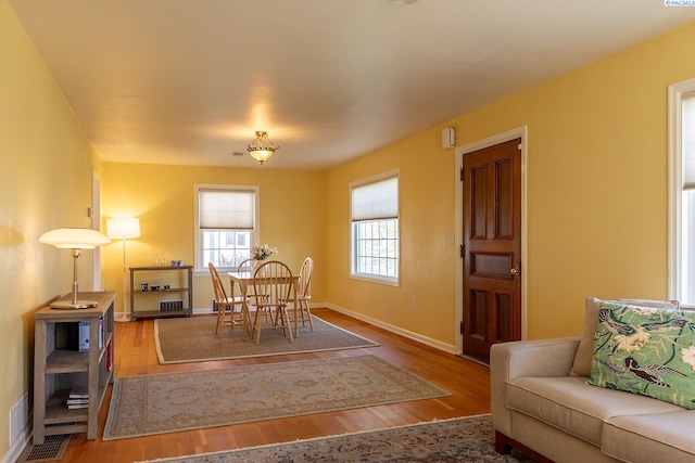 525 SE Water St, Pullman, WA 99163 - dining area featuring wood finished floors, baseboards, and visible vents