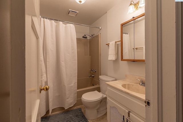 525 SE Water St, Pullman, WA 99163 - bathroom with shower / bath combo, visible vents, toilet, and vanity