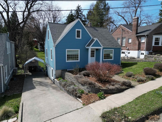 525 SE Water St, Pullman, WA 99163 - bungalow-style home with a detached carport, a shingled roof, and concrete driveway