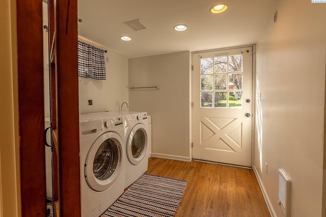 525 SE Water St, Pullman, WA 99163 - washroom featuring laundry area, light wood-type flooring, separate washer and dryer, visible vents, and recessed lighting