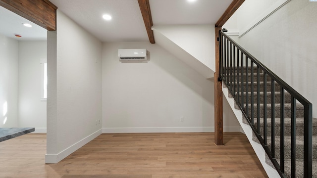 215 E Oak St, Walla Walla, WA 99362 - stairway featuring baseboards, recessed lighting, wood finished floors, and an AC wall unit