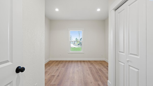 215 E Oak St, Walla Walla, WA 99362 - unfurnished bedroom with light wood finished floors, recessed lighting, and baseboards