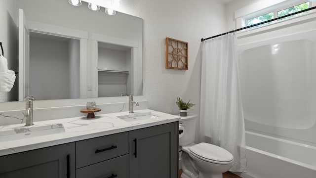 215 E Oak St, Walla Walla, WA 99362 - full bath with double vanity, toilet, shower / bath combination with curtain, and a sink