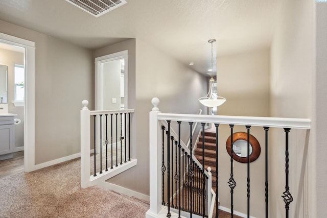 2855 S Dawes Pl, Kennewick, WA 99338 - stairs featuring carpet flooring, baseboards, and visible vents