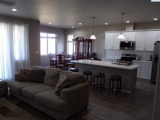 166214 W Johnson Rd, Prosser, WA 99350 - living room with recessed lighting and dark wood-type flooring