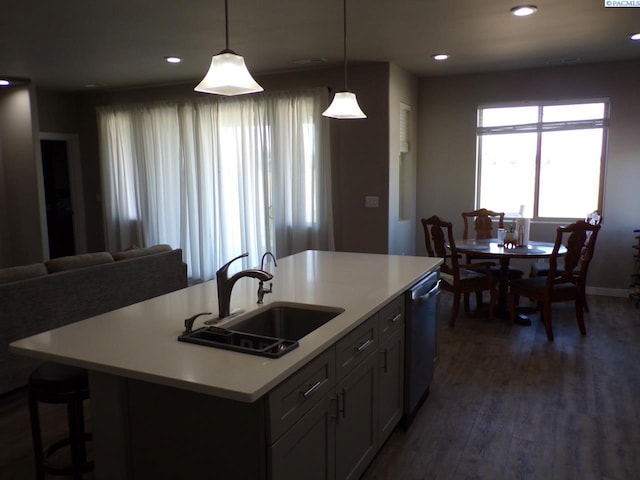 166214 W Johnson Rd, Prosser, WA 99350 - kitchen featuring dishwasher, recessed lighting, light countertops, dark wood-style floors, and pendant lighting