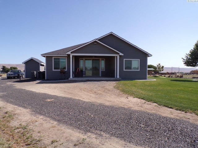 166214 W Johnson Rd, Prosser, WA 99350 - rear view of property with a yard