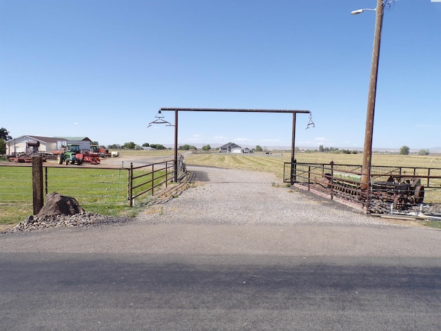 166214 W Johnson Rd, Prosser, WA 99350 - view of dirt / gravel road with a view of countryside and a gated entry