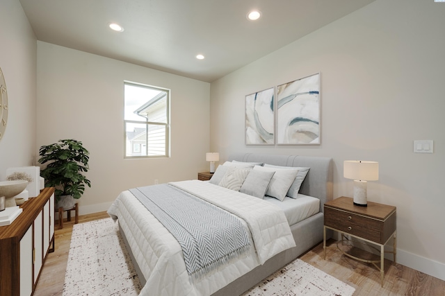 bedroom featuring light hardwood / wood-style floors