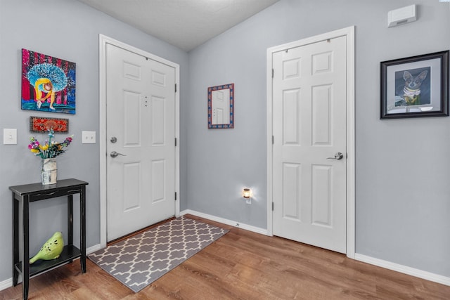 4500 S Dayton Ct, Kennewick, WA 99337 - foyer with baseboards and wood finished floors