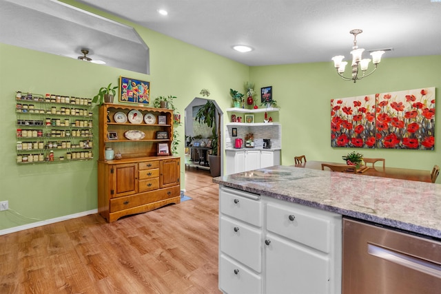 4500 S Dayton Ct, Kennewick, WA 99337 - kitchen featuring dishwasher, a chandelier, white cabinets, light wood-style floors, and light stone counters