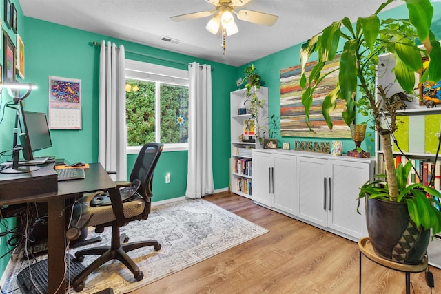 4500 S Dayton Ct, Kennewick, WA 99337 - office area with a ceiling fan, light wood finished floors, and baseboards