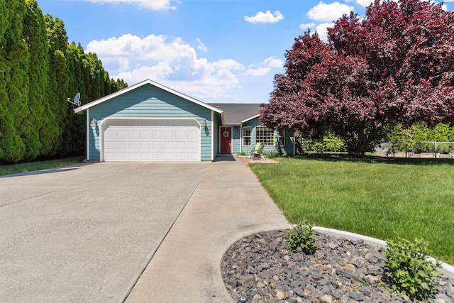 4500 S Dayton Ct, Kennewick, WA 99337 - ranch-style home featuring a front lawn, an attached garage, and driveway