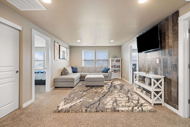 3011 S Dawes Pl, Kennewick, WA 99338 - living room with carpet flooring, recessed lighting, and baseboards