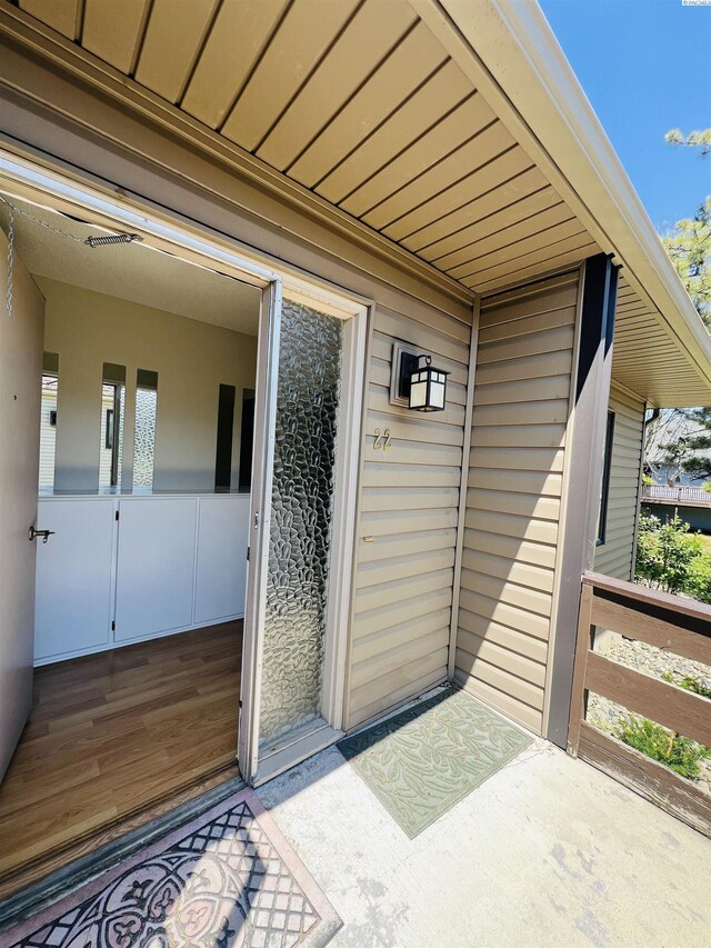 600 SW Crestview St Unit 22, Pullman, WA 99163 - rear view of property featuring a shingled roof, a yard, and a balcony