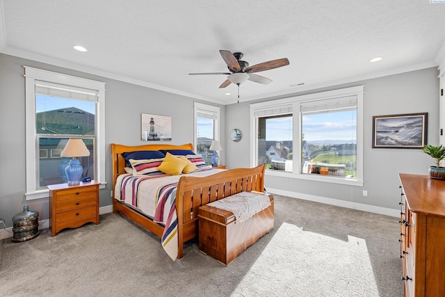 carpeted bedroom with recessed lighting, ornamental molding, baseboards, and ceiling fan