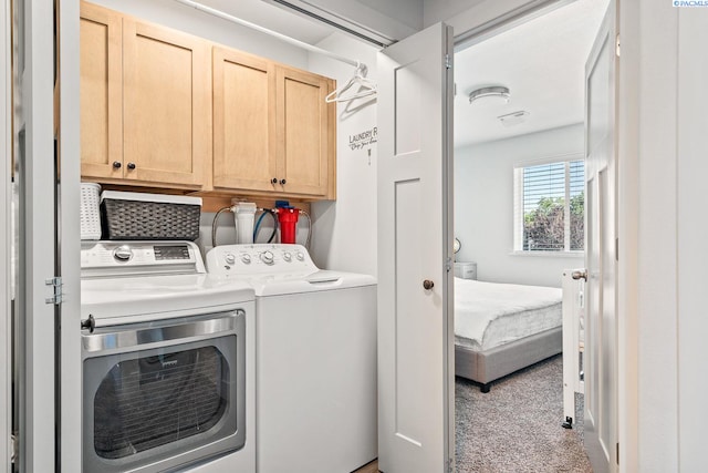1006 Adams St, Richland, WA 99352 - washroom featuring cabinet space, washer and dryer, and carpet