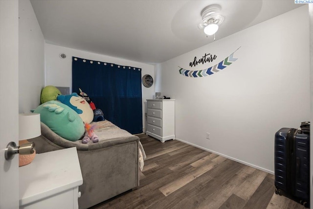 3121 W Hood Ave Unit E103, Kennewick, WA 99336 - bedroom featuring dark wood-style flooring and baseboards