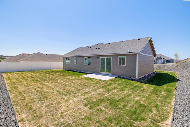 2967 S Penn St, Kennewick, WA 99338 - back of property featuring a patio area, crawl space, and a shingled roof