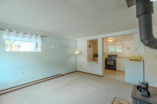 unfurnished living room featuring sink, ornamental molding, a baseboard heating unit, light carpet, and a textured ceiling