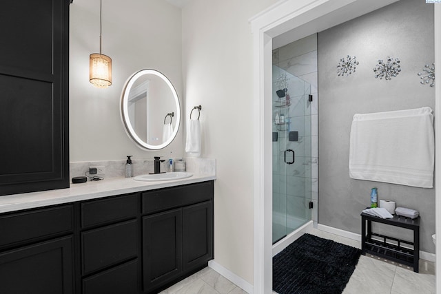 6013 Somerset Ln, Pasco, WA 99301 - full bathroom featuring a shower stall, vanity, and baseboards
