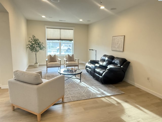 6013 Somerset Ln, Pasco, WA 99301 - living room with wood finished floors, baseboards, and recessed lighting