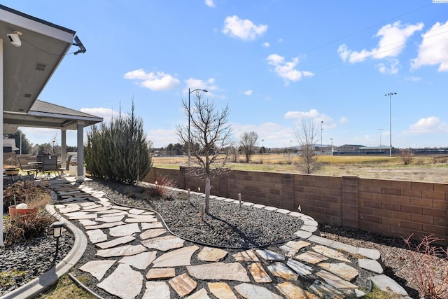 view of patio with fence