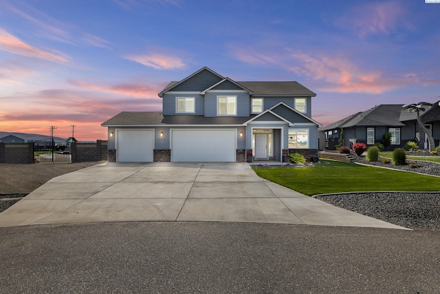 6416 Recurve Rd, Pasco, WA 99301 - traditional home with driveway, a garage, a shingled roof, and an attached garage