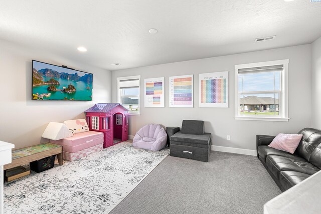 6416 Recurve Rd, Pasco, WA 99301 - carpeted living area featuring baseboards and recessed lighting