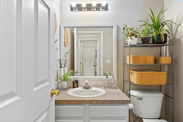 5405 Warbler Ln, West Richland, WA 99353 - half bath featuring vanity and toilet