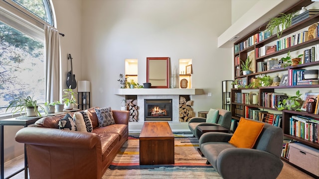 5405 Warbler Ln, West Richland, WA 99353 - living area featuring a towering ceiling and a stone fireplace