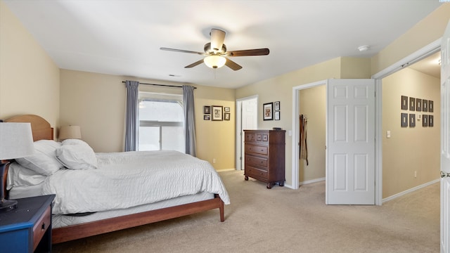 5405 Warbler Ln, West Richland, WA 99353 - bedroom featuring light colored carpet and ceiling fan