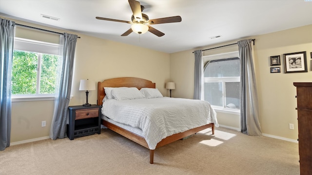 5405 Warbler Ln, West Richland, WA 99353 - bedroom with light colored carpet and a ceiling fan