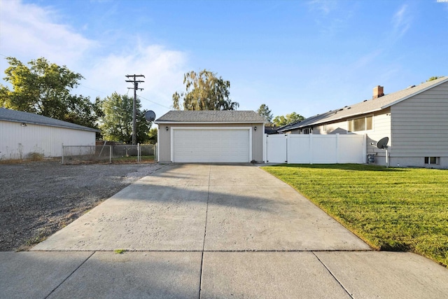 garage with a yard