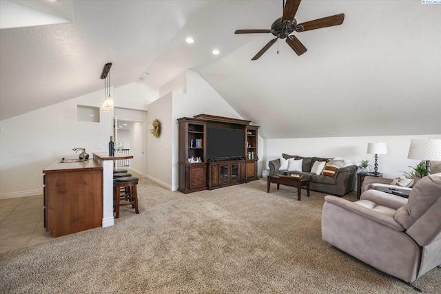 1010 Christopher Ln, Pasco, WA 99301 - living area with vaulted ceiling, ceiling fan, light colored carpet, baseboards, and recessed lighting