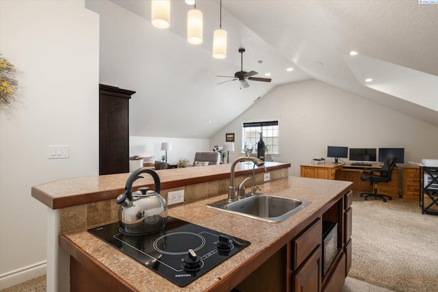 1010 Christopher Ln, Pasco, WA 99301 - kitchen featuring open floor plan, a sink, light colored carpet, recessed lighting, and lofted ceiling