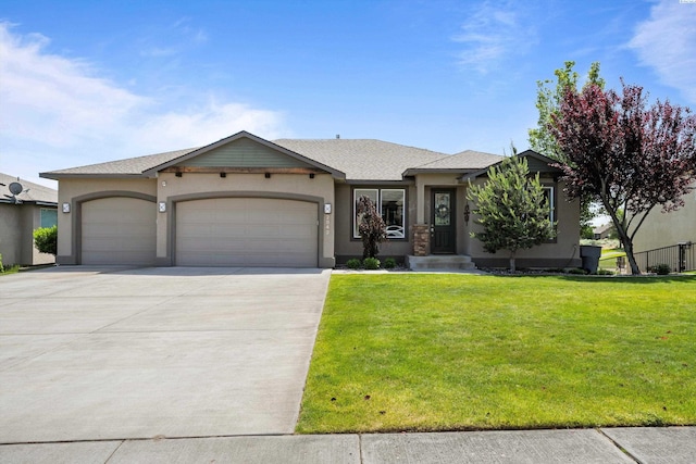 view of front of home with a garage, driveway, a front yard, stucco siding, and a shingled roof