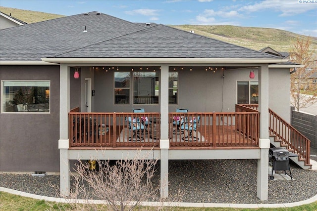 5298 S Quincy Pl, Kennewick, WA 99337 - back of property featuring a deck, stucco siding, and a shingled roof
