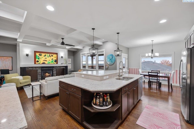 5298 S Quincy Pl, Kennewick, WA 99337 - kitchen with dark wood finished floors, appliances with stainless steel finishes, a sink, and open shelves