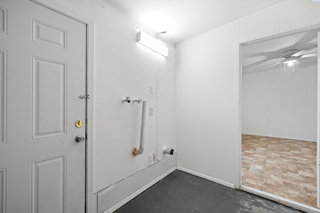 bathroom featuring concrete flooring and ceiling fan