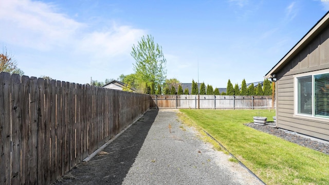 view of yard featuring a fenced backyard